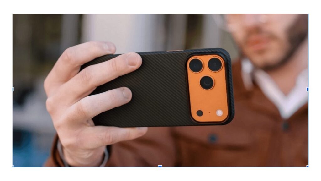A man holding iPhone 17 Pro Max case from ThinBorne